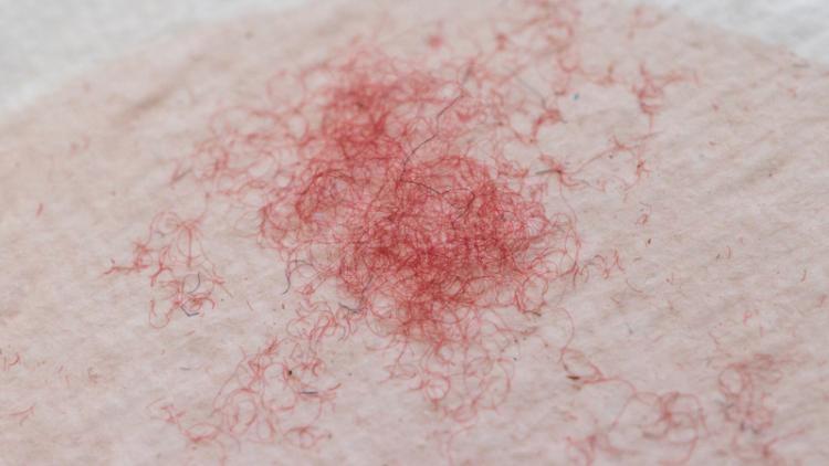 Red fibres collection during shedding tests, copyright RISE